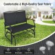 Black iron patio rocking chair for two, featuring a durable metal frame and comfortable seating for outdoor relaxation.