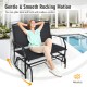 Black iron patio rocking chair for two, featuring a smooth gliding motion, perfect for outdoor relaxation.