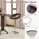 Black height adjustable bar stool with curved hollow back, footrest, and easy-to-clean PU leather surface for comfort.