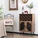 Rustic brown 2-door farmhouse bar cabinet with 11-bottle wine rack and glass holder, perfect for stylish storage.