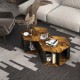 Hexagonal side end table set in a warm finish, featuring open storage compartments for versatile use in living spaces.