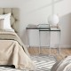 Modern nesting coffee tables with tempered glass tops and steel frames, perfect for stylish and space-saving.