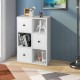 Three-tier white bookshelf with drawers, featuring anti-toppling device, ideal for living room storage and organization.