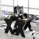 Small black computer desk with storage drawer and raised monitor stand, ideal for office or study use.