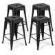 Set of 4 black Tolix style stackable barstools with anti-skid foot pads, ideal for kitchen or home bar use.