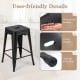 Black 24-inch Tolix style barstool with waterproof surface, center handle, and anti-slip foot pads for kitchen use.