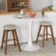 Backless swivel barstools with beige linen fabric seats and rubber wood legs, perfect for counter height use.