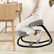 Ergonomic rocking kneeling chair with padded cushion in grey, promoting active sitting for enhanced productivity.