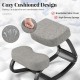 Ergonomic rocking kneeling chair with grey padded cushion, breathable fabric, and sturdy birch wood for active sitting.