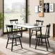 Windsor style armless chairs in black with solid rubber wood frame, perfect for dining or living room settings.