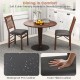 Set of 2 folding chairs with padded seats, rubber wood frame, and waterproof PVC leather for comfortable dining.