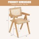 Rattan accent chair dimensions with natural bamboo frame, featuring a cozy backrest and armrest for comfortable seating.