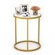 Round side table with faux marble top and golden metal frame, ideal for small spaces in living room or bedroom.
