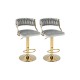 Set of 2 gray swivel barstools with woven backrest and gold finish, adjustable height for kitchen islands and cafes.