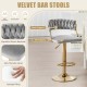 Gray swivel barstool with woven backrest and golden finish, adjustable height for kitchen islands or cafes.