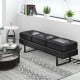 Black waiting room bench seating with removable cushions and metal frame, ideal for reception areas and comfortable.