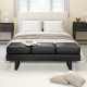 Black waiting room bench with removable cushions and metal frame, designed for comfort and stability in reception areas.