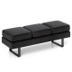 Long black waiting room bench with removable cushions and metal frame, designed for comfort and stability.