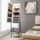 Freestanding jewelry organizer in white with full-length mirror, LED lights, and lockable storage for organized.