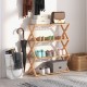 4-tier foldable bamboo shoe rack with slatted shelves, showcasing natural texture, ideal for entryways and compact.