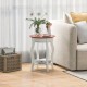 Round end table with walnut top and white legs, featuring a storage shelf, perfect for living room or bedroom use.