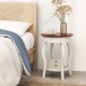 Round end table with walnut top and white rubber wood legs, featuring a storage shelf, ideal for bedroom or living room.