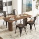 Tolix style dining table set with four stackable metal chairs and wood seats, perfect for modern kitchen spaces.