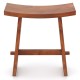 Curved seat shower stool made of solid teak wood, fully assembled, ideal for indoor and outdoor use.