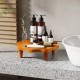 Teak wood pedestal stand with flower-shaped top, ideal for displaying aromatherapy or snacks in any setting.