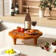Teak wood pedestal stand with flower-shaped top, ideal for displaying snacks and decor in kitchen or patio settings.