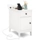 White flip top end table with charging station, USB ports, and drawer, ideal for bedside or sofa side use.