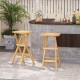 Set of 2 folding outdoor bar stools made of teak wood with ergonomic saddle seats for comfortable seating.