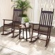 Two high-back acacia wood outdoor rocking chairs with a solid rocking base, perfect for backyard relaxation.