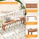 Outdoor wooden bench with teak oil finish, slatted seat for ventilation, perfect for backyard or patio gatherings.