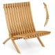 Teak wood folding lounge chair with slatted seat and backrest, ideal for outdoor patios and compact storage.