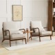 Modern accent chairs with rubber wood armrests and beige cushions, ideal for living rooms or reading spaces.