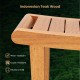Teak shower stool with slatted top, featuring a sturdy design and lower storage shelf for toiletries and towels.