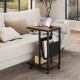 C-shaped side table with a brown wood finish, canvas storage pouch, and metal frame, perfect for small spaces.