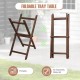 Foldable tray table made of solid teak wood with removable tray top, perfect for patio and garden use.
