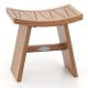 Curved seat teak wood shower bench with sturdy legs, ideal for bathroom or outdoor use, promoting comfort and drainage.