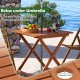 Square patio dining table with teak finish, umbrella hole, and X-shaped structure for stability, perfect for outdoor.