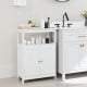 White bathroom floor cabinet featuring a spacious top, ideal for toiletries, with two doors for concealed storage.