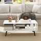 Mid century modern white coffee table with 2 open compartments and tapered metal legs, ideal for living room.