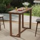 Outdoor bar table with slatted top made of premium teak wood, perfect for patio gatherings and bar chairs 28"-32" high.