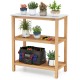 3-tier garden potting bench table with acacia wood frame and marble-like countertop, ideal for backyard and gardening.