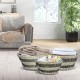 Stackable set of 3 natural canes grass baskets with hollowed handles for stylish and organized storage in any room.