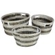 Stackable set of 3 natural canes grass baskets with hollowed handles for convenient storage and organization.