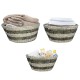 Set of 3 natural canes grass baskets with hollowed handles, ideal for stylish and organized storage in any room.