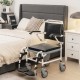 4-in-1 bedside commode wheelchair with detachable bucket, adjustable height, and waterproof PVC surface for versatile.