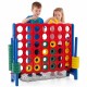 Children playing with the Jumbo 4 in a Row Game Set, featuring red and yellow chess pieces for indoor or outdoor fun.